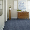 tempo area rug in room view in colour midnight blue